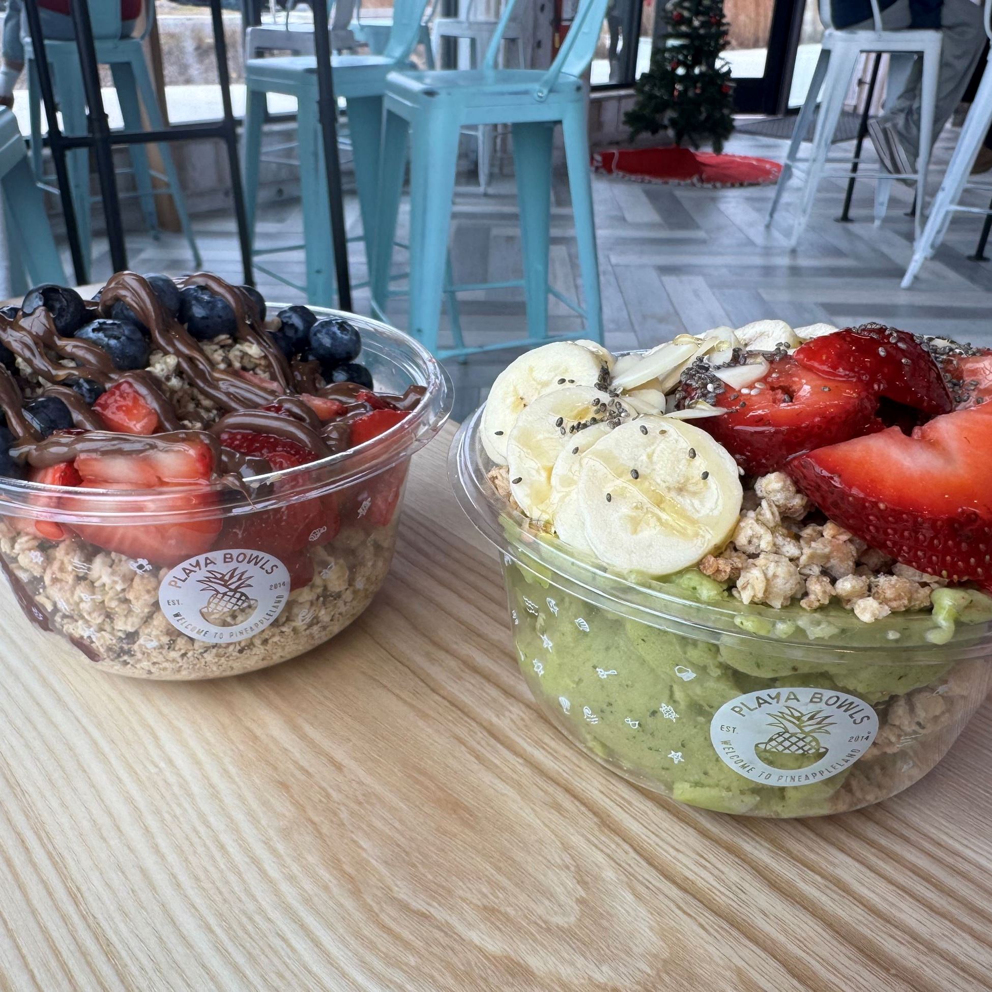 acai bowls with strawberries, blueberries and granola